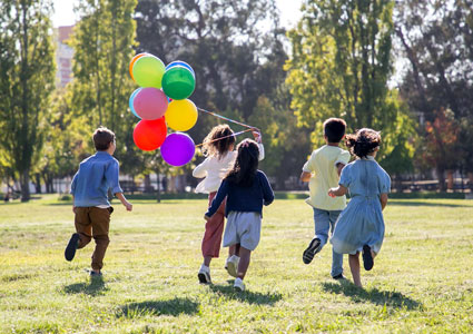 Kids running in park